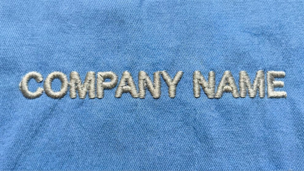 Close up of bold satin stitch lettering with clean edges