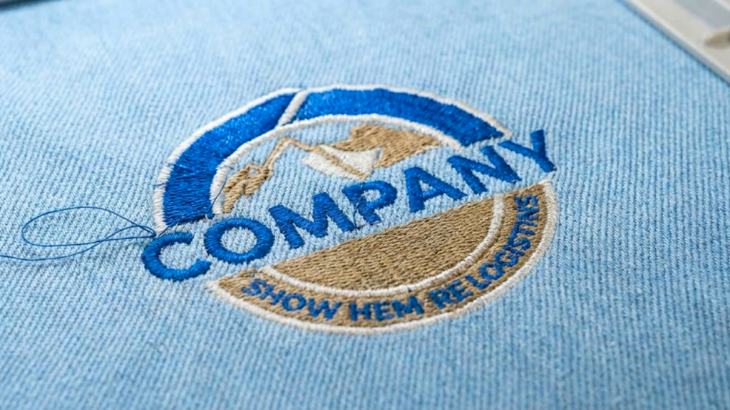 Close up of satin stitch embroidery logo showing correct density and stitch angles